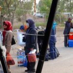 Raise Awareness about rights of MEK members on International Migrants' Day MEK members' transfer to Albania