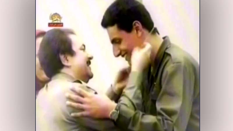 , Rajavi gave all the new members an icon and put it around our necks