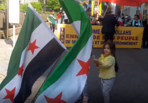 سوری ها در تجمع مجاهدین چه می کردند؟